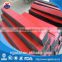 Impact resistant red UHMWPE with rubber buffer strip