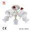 White chandelier with small red flower decoration in Russia style