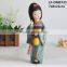 Japan girl Holding book dance statue resin crafts