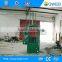 Vertical clothing baling machine