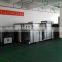 Two screen X-ray bus station conveyor roller for inspection