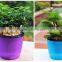 Plastic self watering flower pot