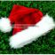 China factory red custom machine sewing fabric Xmas cap wool felt Christmas ideas hat with pointed white pompon for festival