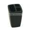 Black toothbrush holder toothbrush and toothpaste inside