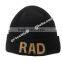100% acrylic soft beanie hat with fashion metal letter trims attached on cuff wholesale factory  china