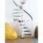 White iron spiral stairs with black handrails