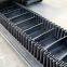What are the benefits of high-angle conveyor belts?