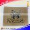 Customized Embossed fake leather label with metal for jeans