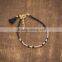blue green seed bead bracelet with gold tube