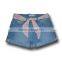 blue washed rolled-cuff denim shorts with floral poplin belt