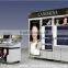 pink cosmetic design wooden display showcase and shelf for makeup store