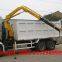 high quality and good price HOWO brand 6*4 LHD/RHD dump tipper truck with crane for sale