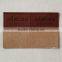 Custmized embossed leather tag produced by  credible factory ,for jeans