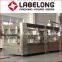 Автоматическая машина для наполнения карбонатными безалкогольными напитками пластиковых бутылок из ПЭТ с производительностью 3000 бутылок в час