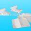 Non-woven adhesive wound dressing
