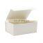 Custom ribbon style luxury ivory color foldable magnet product packing box wholesale