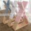 Colorful wooden floating triangle style wall shelf