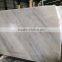 Polished cheap Chinese Guangxi white marble slab with red veins