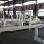High speed carton folding and gluing machine