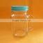 glass mason jar with handle and straw