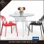 Tempered glass top solid metal based round dining table