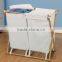 Promotional wicker laundry basket stand