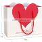 Promotional custom logo printed cheap shop paper bags