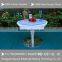 Battery rechargeable LED plastic rotating round production table with legs metal