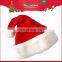 Plush red decorated santa hat for christmas' day