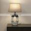 Modern art style grey and white base bedroom ceramic desk lamp for hotel