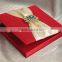 Hot sale elegant red silk hardcover wedding invitations with yellow ribbons&colorful crystal brooches                        
                                                Quality Choice