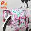 beautiful rose blossom pannier bike