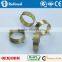 Small compression coil torsion spring, metal clamps