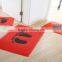 Red coil mat with all kinds of logo