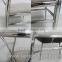 vintage industrial tubular metal frame chair with modern leather seat