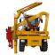 Loader guardrail pile driver