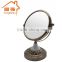 Green bronze magnifying antique table mirror