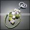 Factory price grape fruit bobbles, pompon,rhinestone magic cube metal keychain
