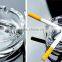 clear glass ashtray with different size square and round shape