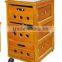 Orange vegetable storage cabinet