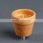 outdoor citronella candles in tareped terracotta pot