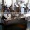 Economic type semi-automatic capsule and grains filling machine