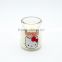 scented candle with printing kitty in glass jar
