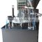Portion cup automatic filling and sealing machine