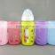 Circle And Star Design Sleeve 240ml Wide Neck Borosilicate Glass Baby Bottle With Silicone Sleeve