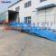 Mobile heavy duty warehouse ramp for loading and unloading