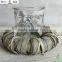 Natural hurrican candle holder with grey wicker ring and glass and snowflake