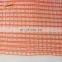 orange building construction scaffold safety net