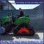 Tractor modification with triangular chain track assembly for strong off-road performance