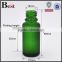 2017 high quality 15ml oil glass bottle green round shape oil glass bottle silver cap oil glass bottle with stopper
